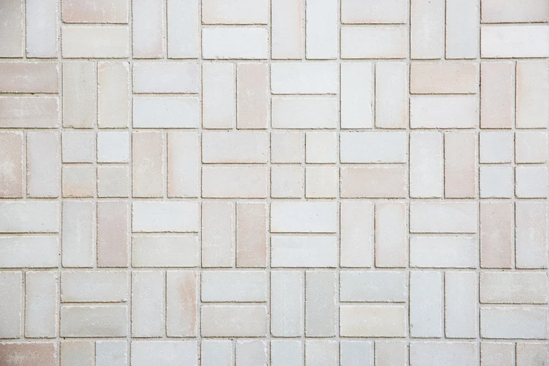 A tightly fitted basket weave paving stone pattern illustrates how long paving stones last when properly installed in Ottawa.